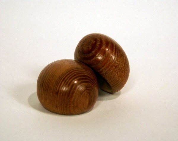 Custom-stained wooden caps, available in bulk for manufacturers and high-volume production.